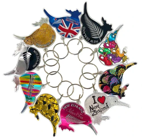 Bundle of 10 assorted NZ Kiwi-shaped souvenir keyrings with foil designs