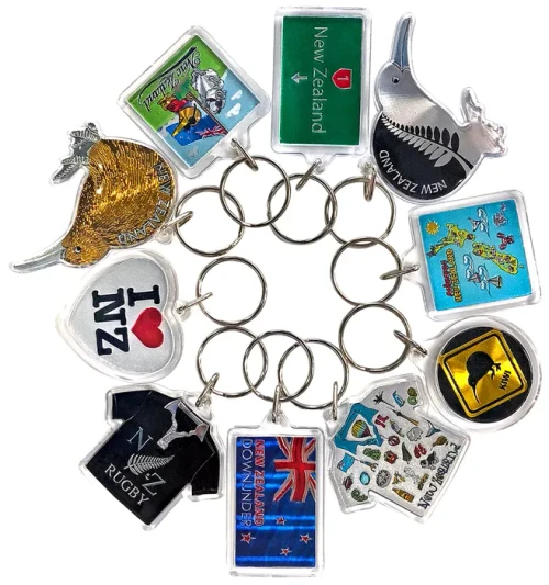 Pack of 10 assorted NZ souvenir keyrings with New Zealand foil designs