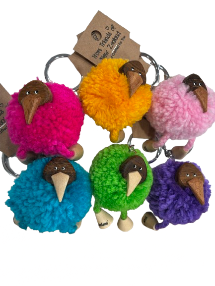 Group of six colourful New Zealand kiwi pom-pom keyrings with wooden faces and dangly legs