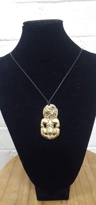 Metal Tiki Pendant on cord (comes polished brass or antiqued)