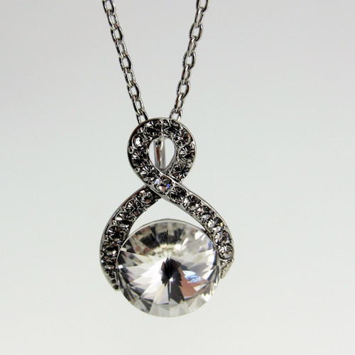 single round clear crystal necklace with infinity pattern surround