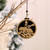 Black and Gold round hanging decorations with Christmas scenes