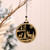 Black and Gold round hanging decorations with Christmas scenes
