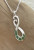 long teardrop twin koru pendant NZ Greenstone set in sterling silver on 45cm silver chain