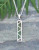 NZ Greenstone pendant set in Sterling silver zig zag pattern