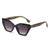 Black frame "cats eye" style sunglasses with colourful plaid arms and purple tint lens