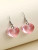 semi transparent 3D pink heart earrings on hooks