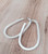 Large brushed silver colour oval hoop earring on posts