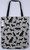 Black dogs on tote bag