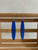 Kowhaiwhai wave blue tinted acrylic  hook earrings