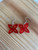 open frangipani red acrylic hook earrings