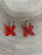 open frangipani red acrylic hook earrings