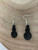 Small Pikorua twist black acrylic earrings