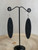 Long oval black acrylic earrings with swirl design