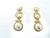 gold coloured Art deco style pearl drop earring