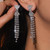 Silver plated tassel with rhinestone drop earrings from bow stud on posts