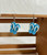 Blue pair of jandal earrings on hooks