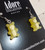 lime coloured gummy bear with skeleton outline earrings