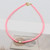 Threaded flat bead necklace with faux pearl - pink