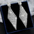 Long rhombus shapes earrings with diamantes on post