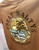 Brown children's Napier NZ souvenir t-shirt with shark fin on the  front and beach scene on the reverse - size 4-