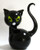 Small handcrafted black glass art cat with green eyes