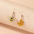 Cute bee and honeycomb asymetrical earrings on hooks