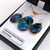 Oval paua earring and pendant set with gold plating