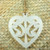 Heart-shaped acrylic wall hanging with cut-out kōwhaiwhai design