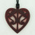Acrylic heart necklace with cut-out kōwhaiwhai design