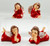 Assorted angels in red figurines