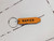 Yellow Napier street sign souvenir keyring made in New Zealand