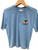 Sky blue Napier NZ T-shirt with whale tail and waves design