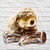 Ornamental hedgehog on log