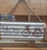 Bike on hanging tin sign | Take time Enjoy Life