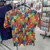 Kids’ T-shirt featuring a colourful rainbow kiwi design