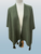 Women's warm textured knit cape with tassels