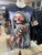 Front veiw of Skeleton Reaper T-Shirt | Skull Staffed