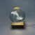 Dolphin in crystal ball with LED light on wood base