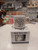 Grey ceramic NZ souvenir mug with tattoo-style kiwi bird design