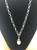 Teardrop style shell pearl pendant on 60cm long silver chain (comes black or cream)