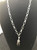 Teardrop style shell pearl pendant on 60cm long silver chain (comes black or cream)