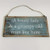 Funny rustic wooden sign reading ‘A lovely lady and a grumpy old man live here’ farmhouse wall decor.