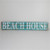 Aqua Beach House sign with hooks