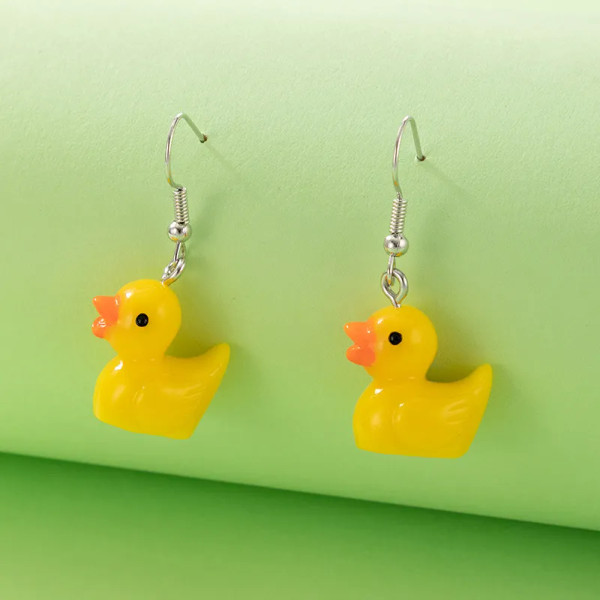 yellow duck earrings on silver coloured hooks