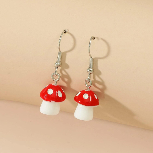 red mushroom with white spots on top earring on hook