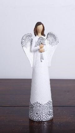 Angel figurine holding flowers