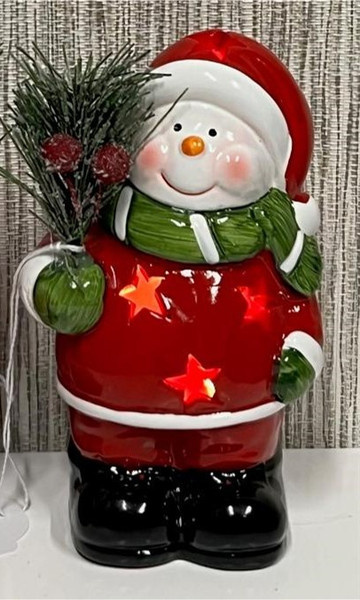 Standing snowman ornament with tree sprig and  LED lights inside