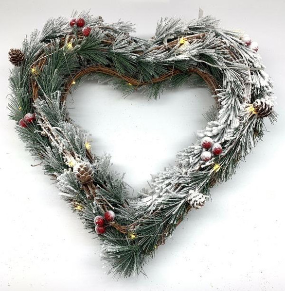 Christmas wreath in shape of heart with lights