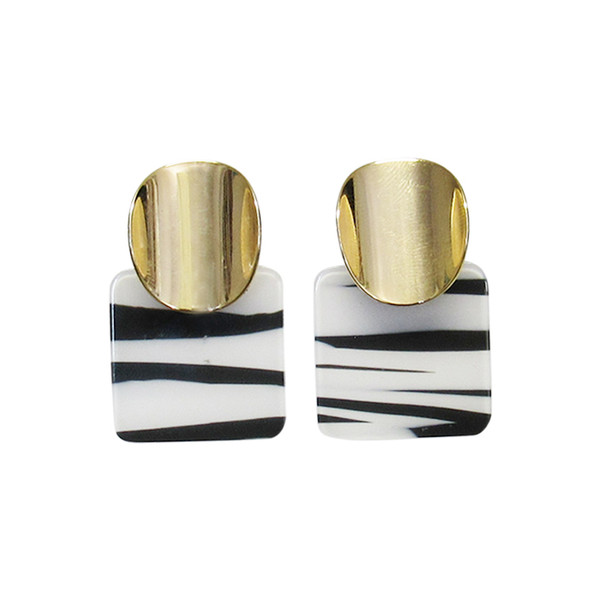 Zebra stripes pattern earrings hung under gold circle stud on posts